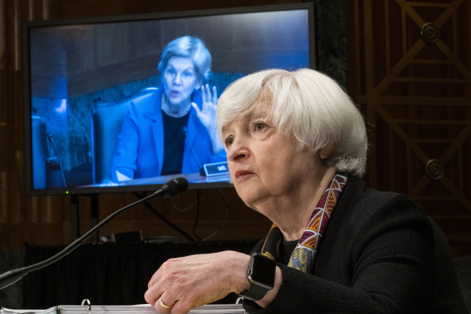 Sen. Elizabeth Warren, D-Mass., on monitor, questions Treasury Secretary Janet Yellen 