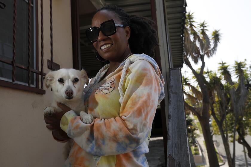 LOS ANGELES, CALIF. - APR. 4, 2020. Elizabeth Morrison, recently had her offer accepted for a home in South LA. (Luis Sinco/Los Angeles Times)