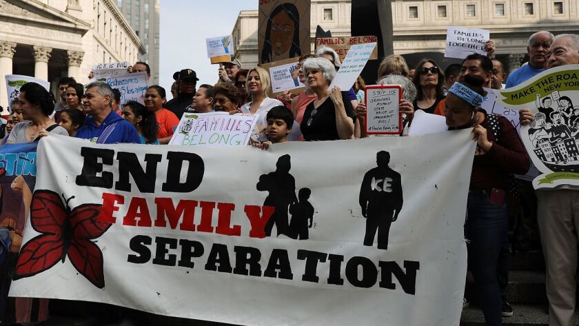 Immigrants' rights activists demonstrate against forced separation of migrant children from their parents in New York on June 1.