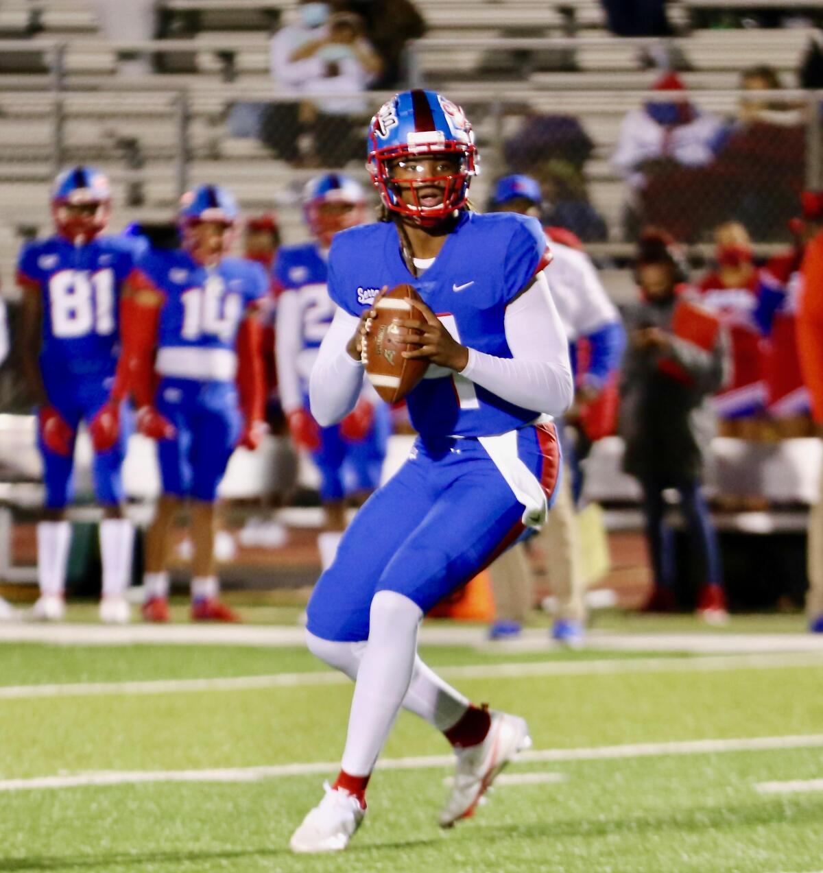 Gardena Serra quarterback Maalik Murphy drops back to pass.