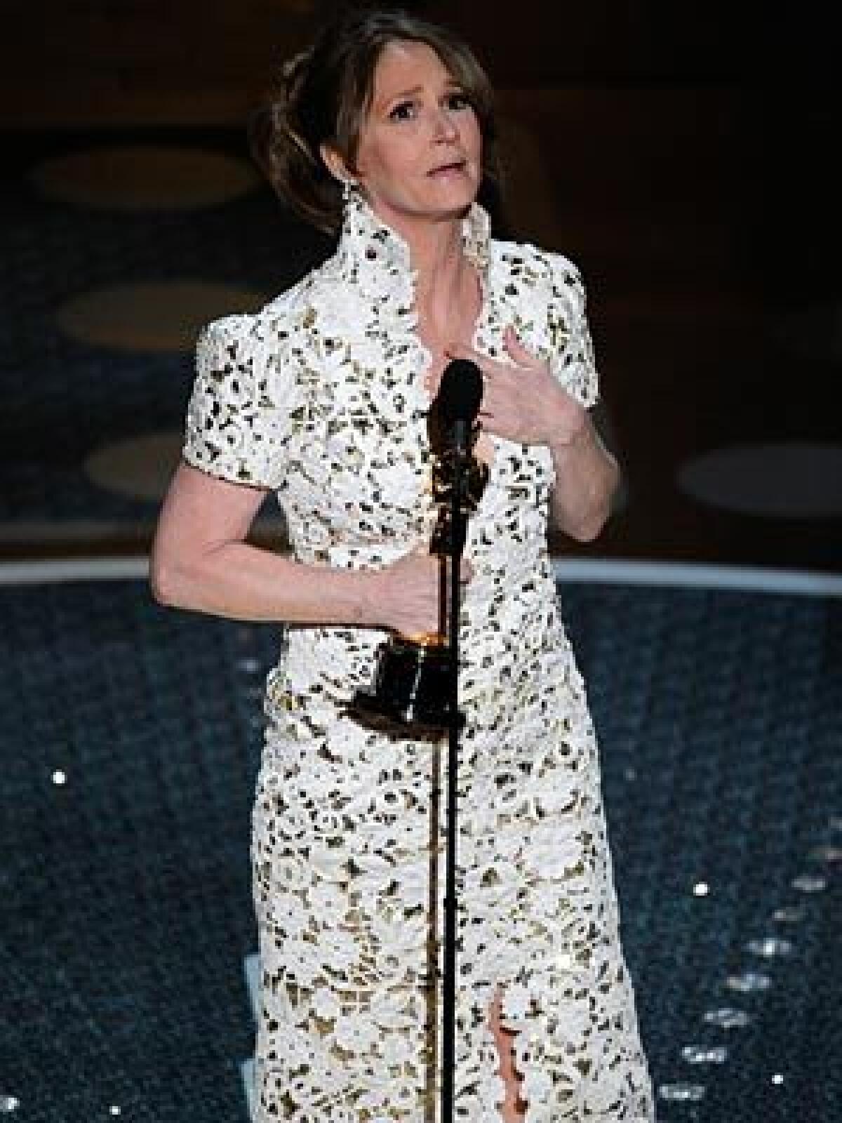 Melissa Leo wins the supporting actress award for her role in "The Fighter."