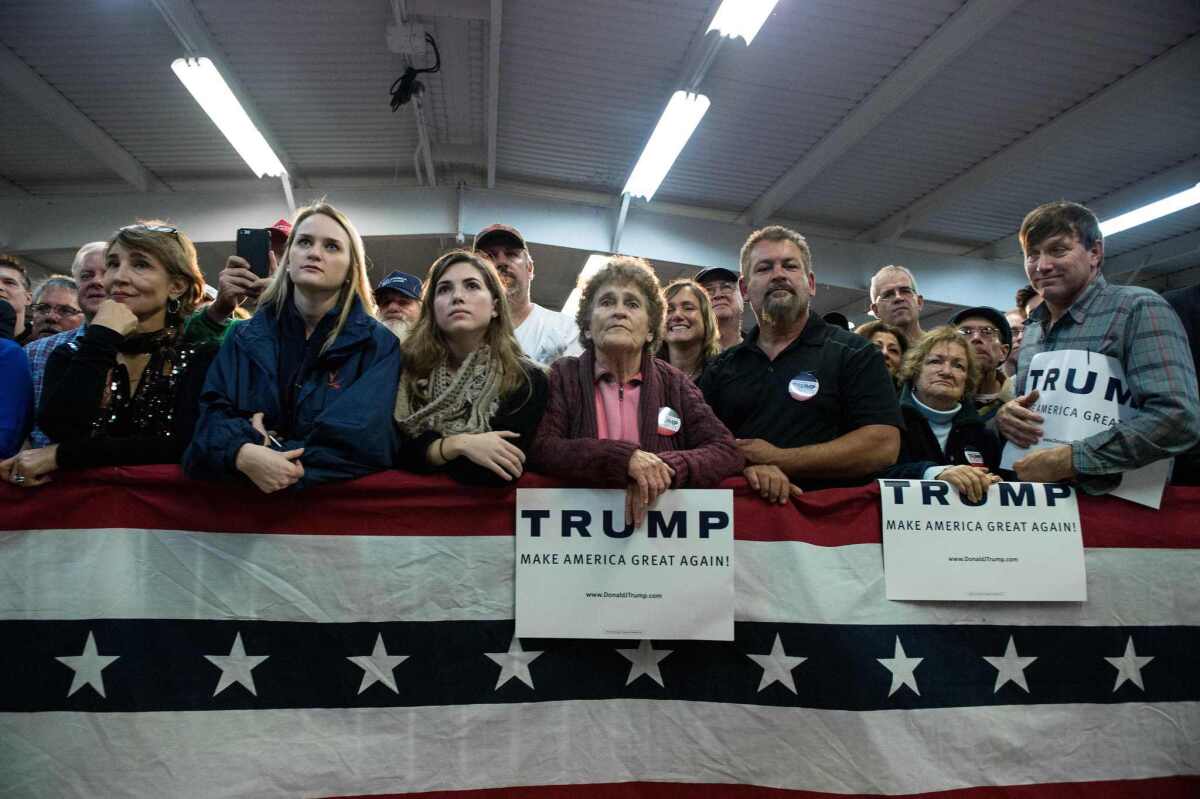 Supporters of Republican presidential candidate Donald Trump listen to him address a campaign rally in Manassas, Va. on Dec. 2.