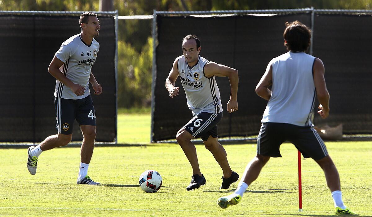 Landon Donovan works out with teammates during a practice session at StubHub Center's University Field in Carson Friday.
