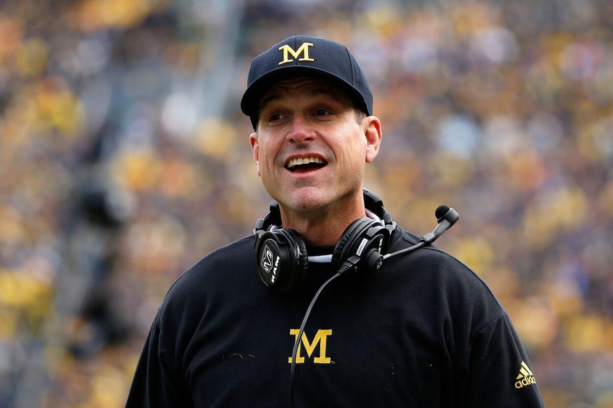 Michigan's Jim Harbaugh coaches the Wolverines against Michigan State on Oct. 17.