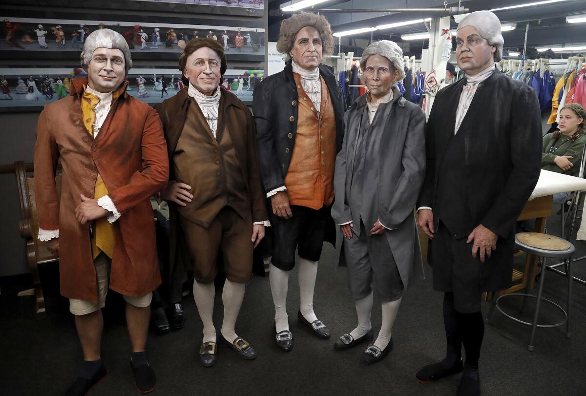 Cast members who play in the "Declaration of Independence" tableaux vivant wait before they take the stage.