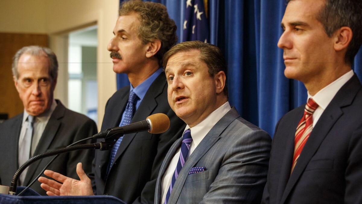 City Controller Ron Galperin, seen at microphone with other city leaders in 2015, opposes a plan to borrow $60 million to cover the cost of legal settlements and court judgments.