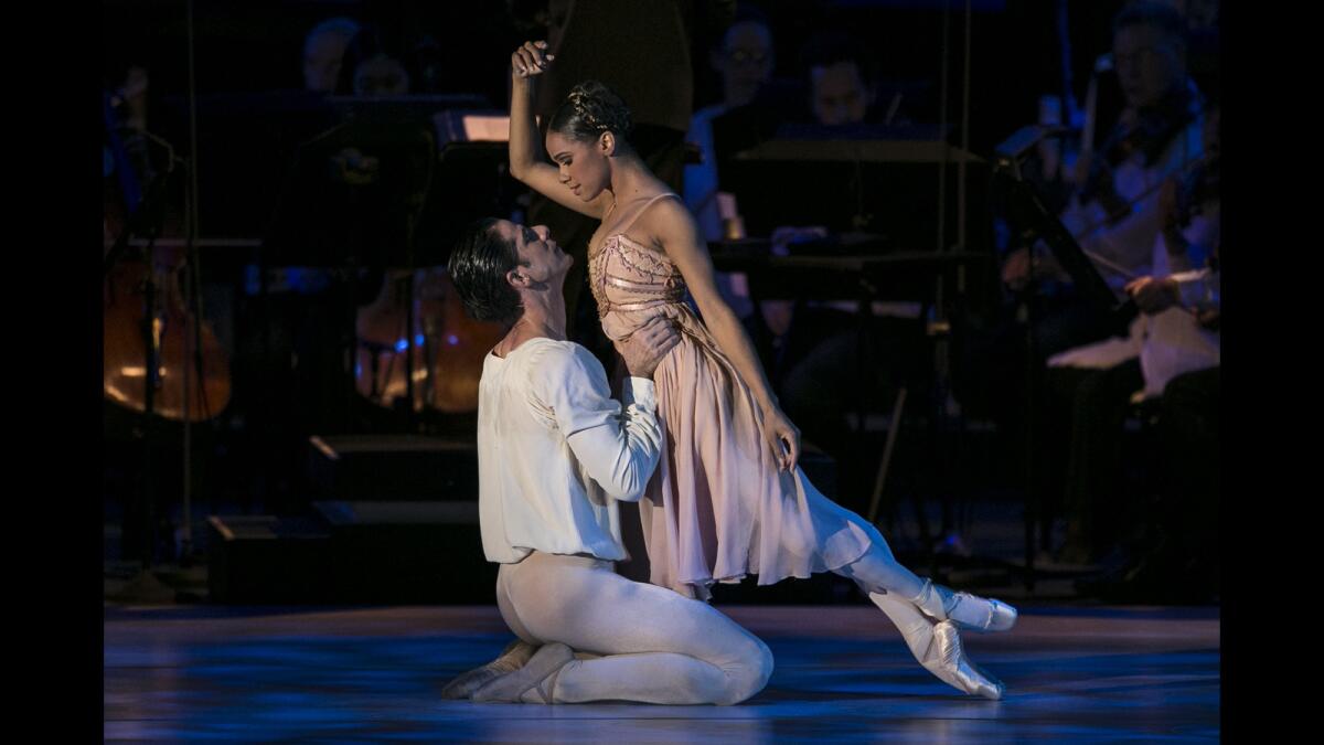 Marcelo Gomes and Misty Copeland perform a scene from Prokofiev's "Romeo and Juliet" with the LA Phil at the Hollywood Bowl.