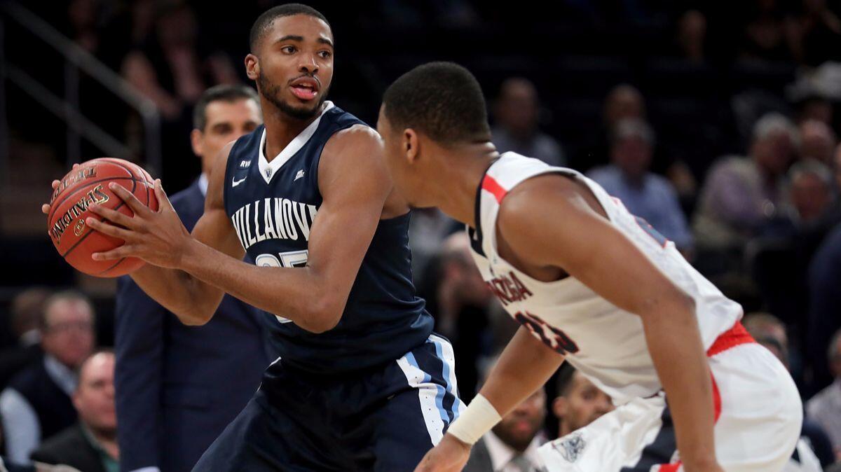 Villanova's Mikal Bridges (25) looks down the court against Gonzaga's Zach Norvell Jr. (23) in the second half at Madison Square Garden on Tuesday in New York.