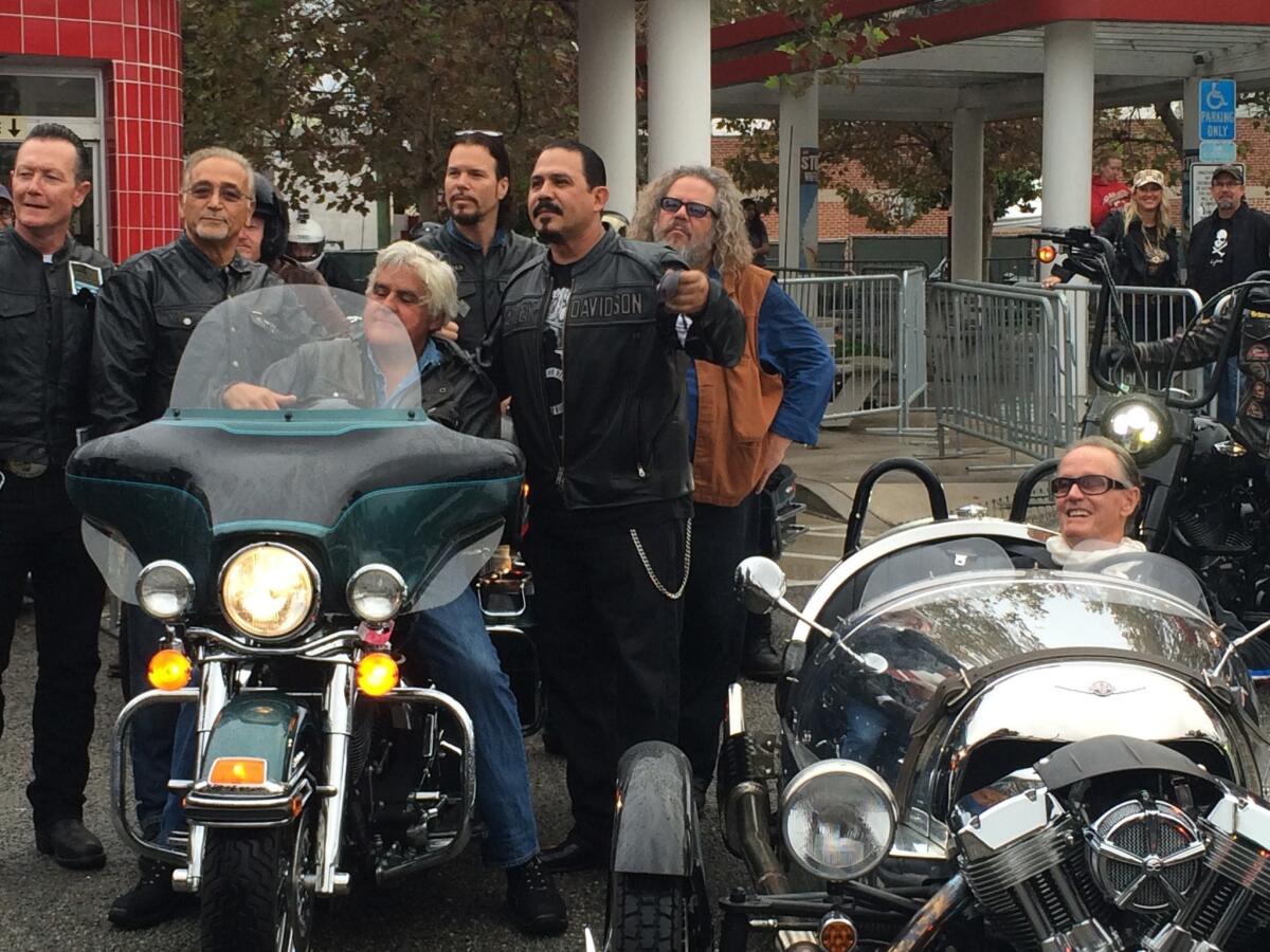 Celebrity motorycle enthusiasts -- from left, actor Robert Patrick, Love Ride founder Oliver Shokouh, comedian Jay Leno, the cast of "Sons of Anarchy" and "Easy Rider" actor Peter Fonda -- gather for the start of the 32nd and final running of the annual charity fundraiser.