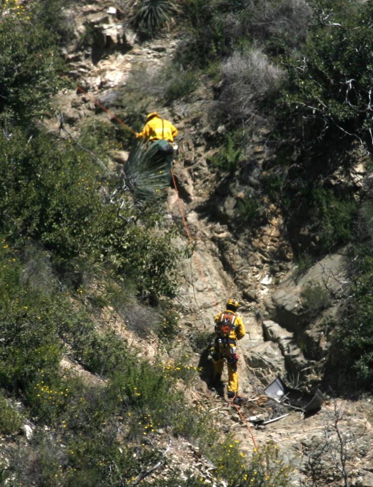 Photo Gallery: Vehicle found over the edge in Angeles National Forest