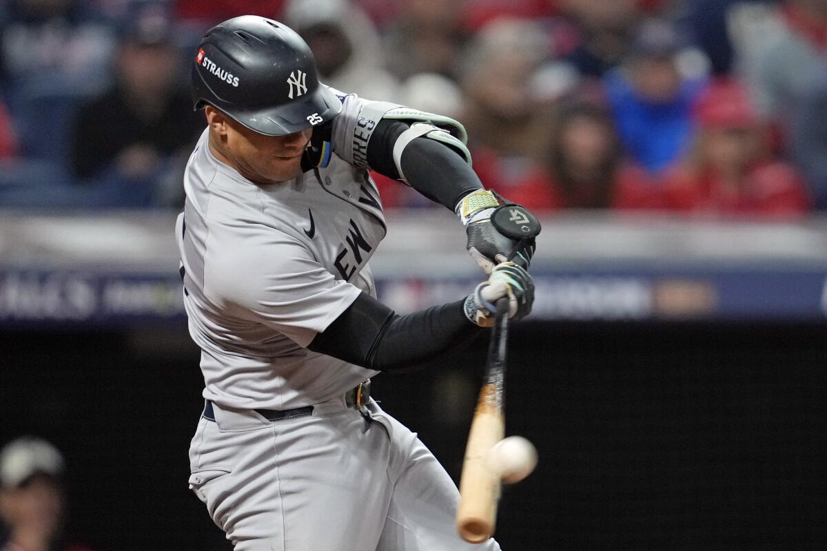 The Yankees' Gleyber Torres hits a ball.