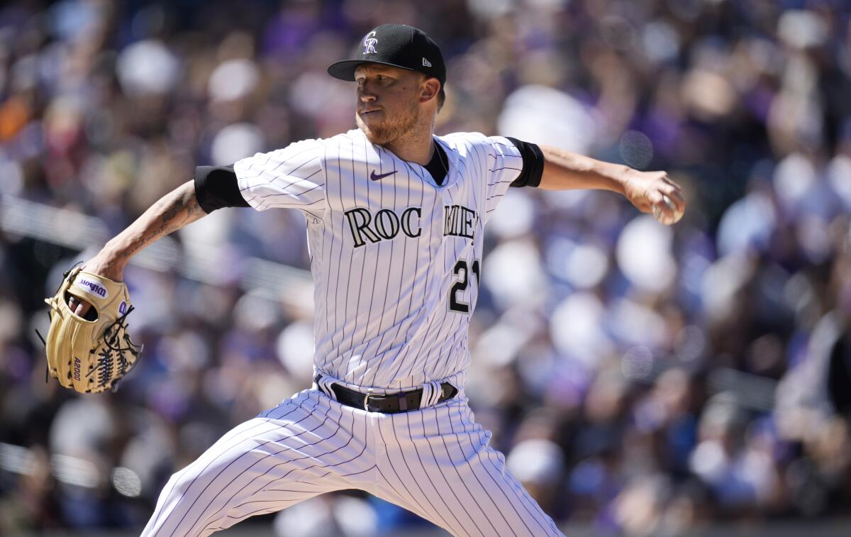 Colorado Rockies starting pitcher Kyle Freeland delivers during the first inning.