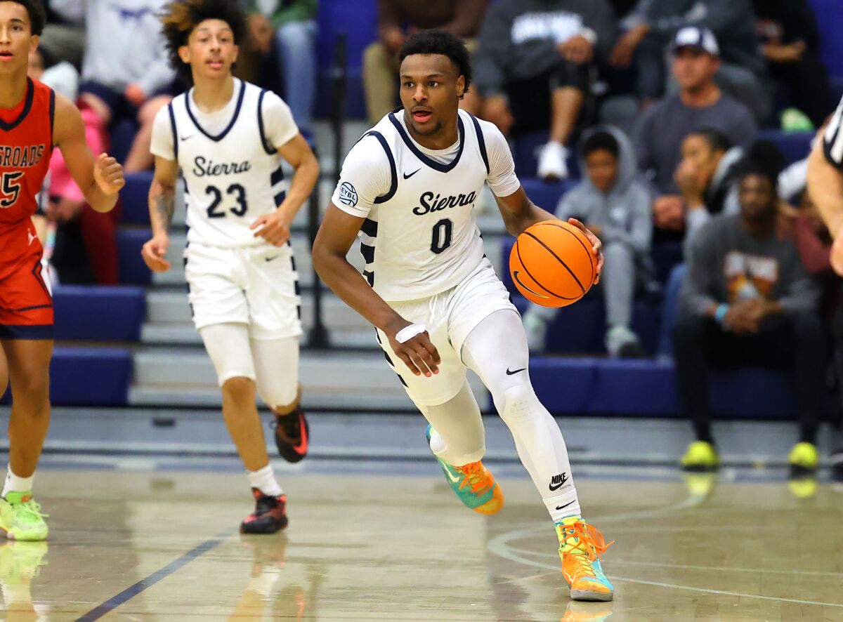 Sierra Canyon's Bronny James dribbles during a game against Crossroads on Nov. 30, 2022.