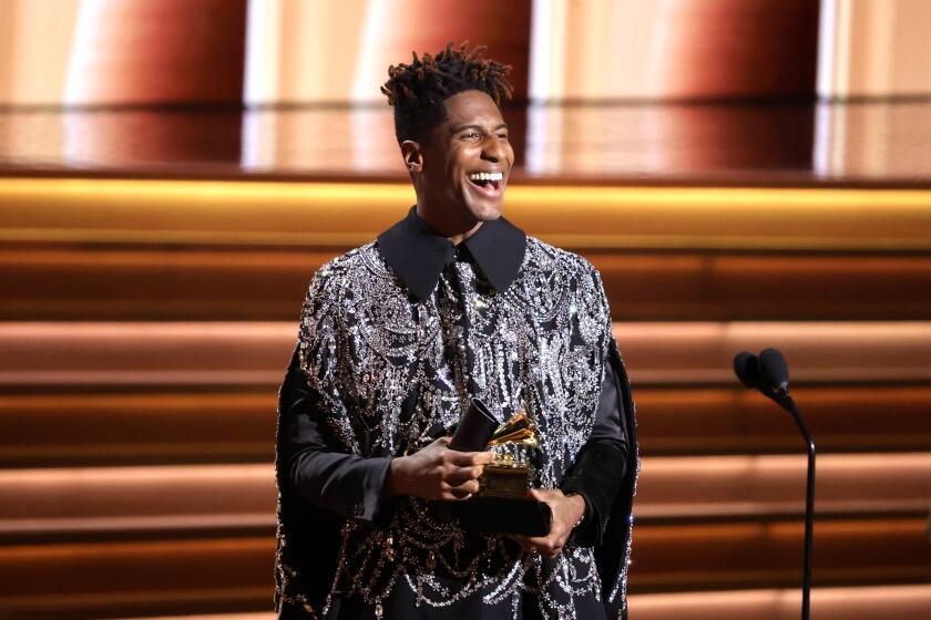 LAS VEGAS, NEVADA - APRIL 03: Jon Batiste accepts the Album of the Year award for “We Are” onstage during the 64th Annual GRAMMY Awards at MGM Grand Garden Arena on April 03, 2022 in Las Vegas, Nevada. (Photo by Matt Winkelmeyer/Getty Images)