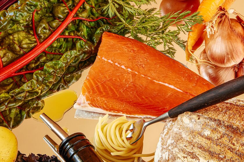 Staples of the Mediterranean diet: grains, root vegetables, olive oil, hummus, leafy greens and lean fish like salmon.