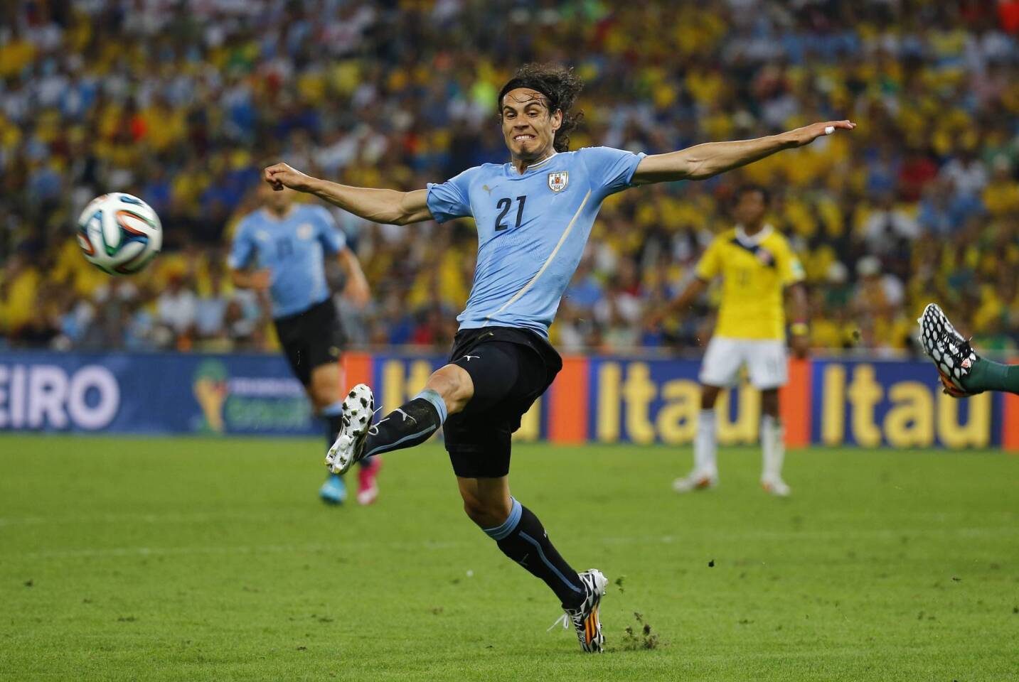 Uruguay's Cavani kicks the ball during their 2014 World Cup round of 16 game against Colombia at the Maracana stadium in Rio de Janeiro