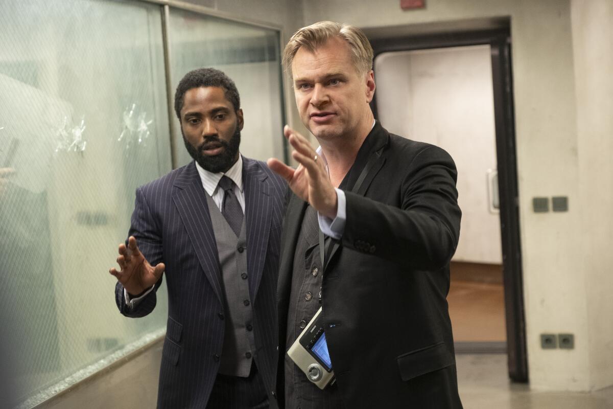 Director Christopher Nolan and John David Washington on the set of "Tenet"