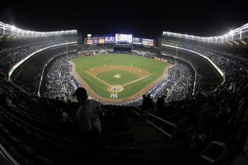The New York Yankees play the Chicago Cubs during the third inning of a major league baseball exhibition game Friday, April 3, 2009 at the new Yankee Stadium in New York. The game is the Yankees' inaugural game at the new stadium. (AP Photo/Julie Jacobson)