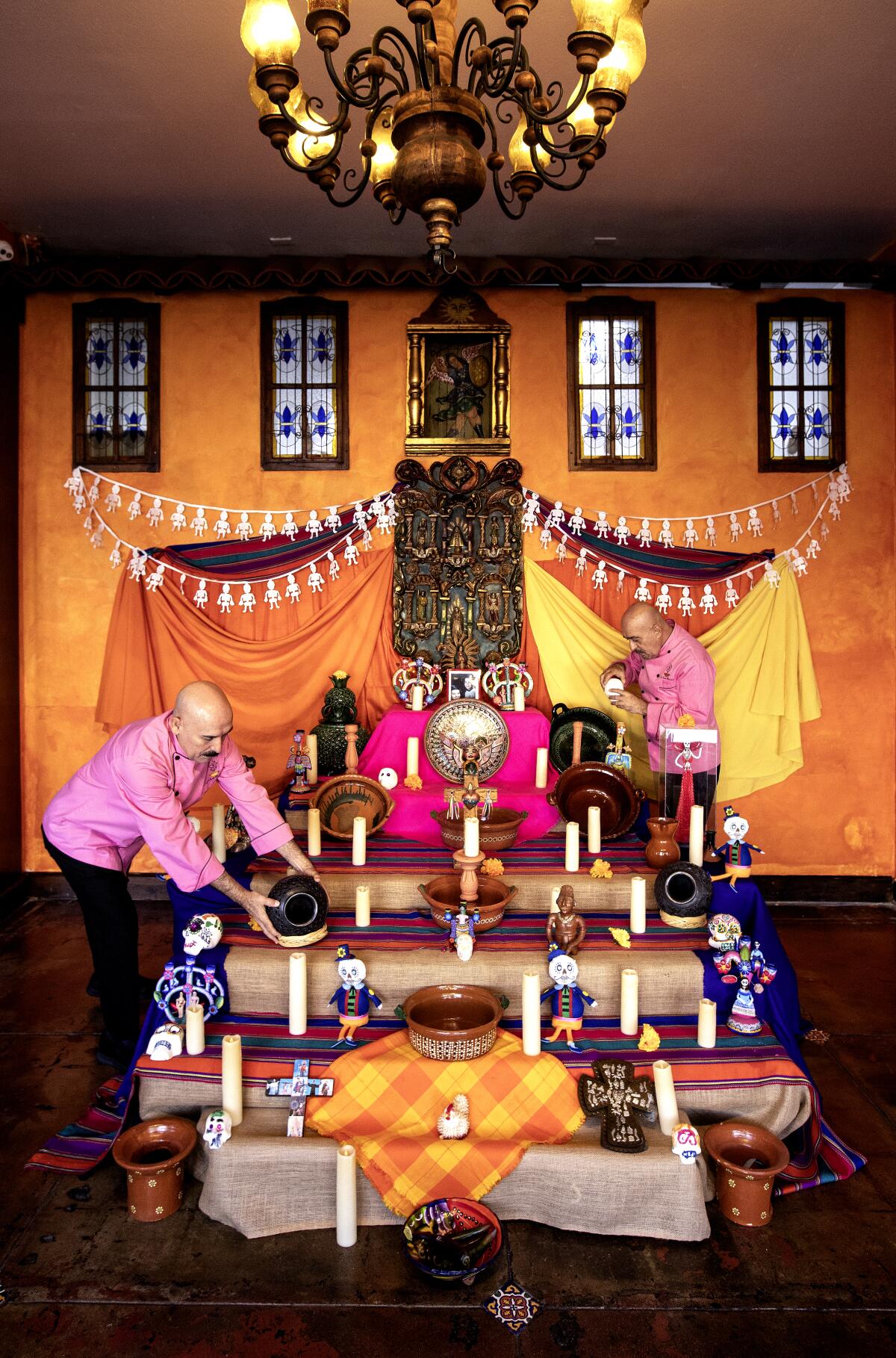 The restaurant’s chef owners Ramiro Arvizu and Jaime Martin del Campo erect a Day of the Dead altar each year.