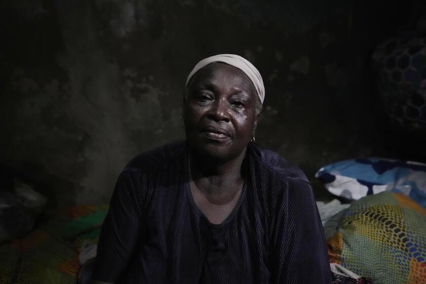 Funmilayo Kotun, 66-years-old, a malaria patient is photographed in her one room in Makoko neighbourhood of Lagos, Nigeria, Saturday, April 20, 2024. When cases of locally transmitted malaria were found in the United States last year, it was a reminder that climate change is reviving the threat, or broadening the range, of some diseases. But across the African continent malaria has never left.(AP Photo/Sunday Alamba)