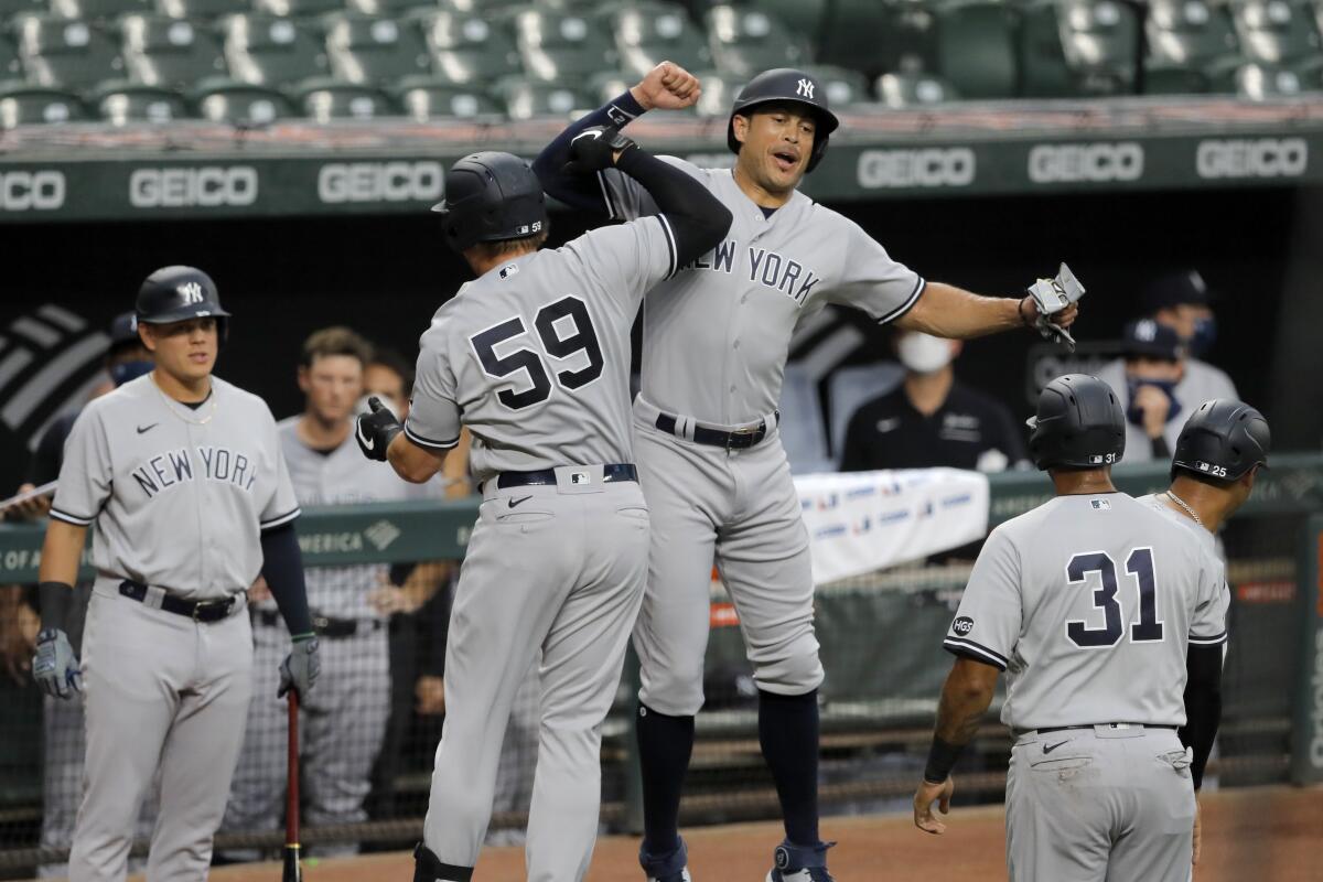 New York Yankees' Luke Voit celebrates after hitting a 2-run