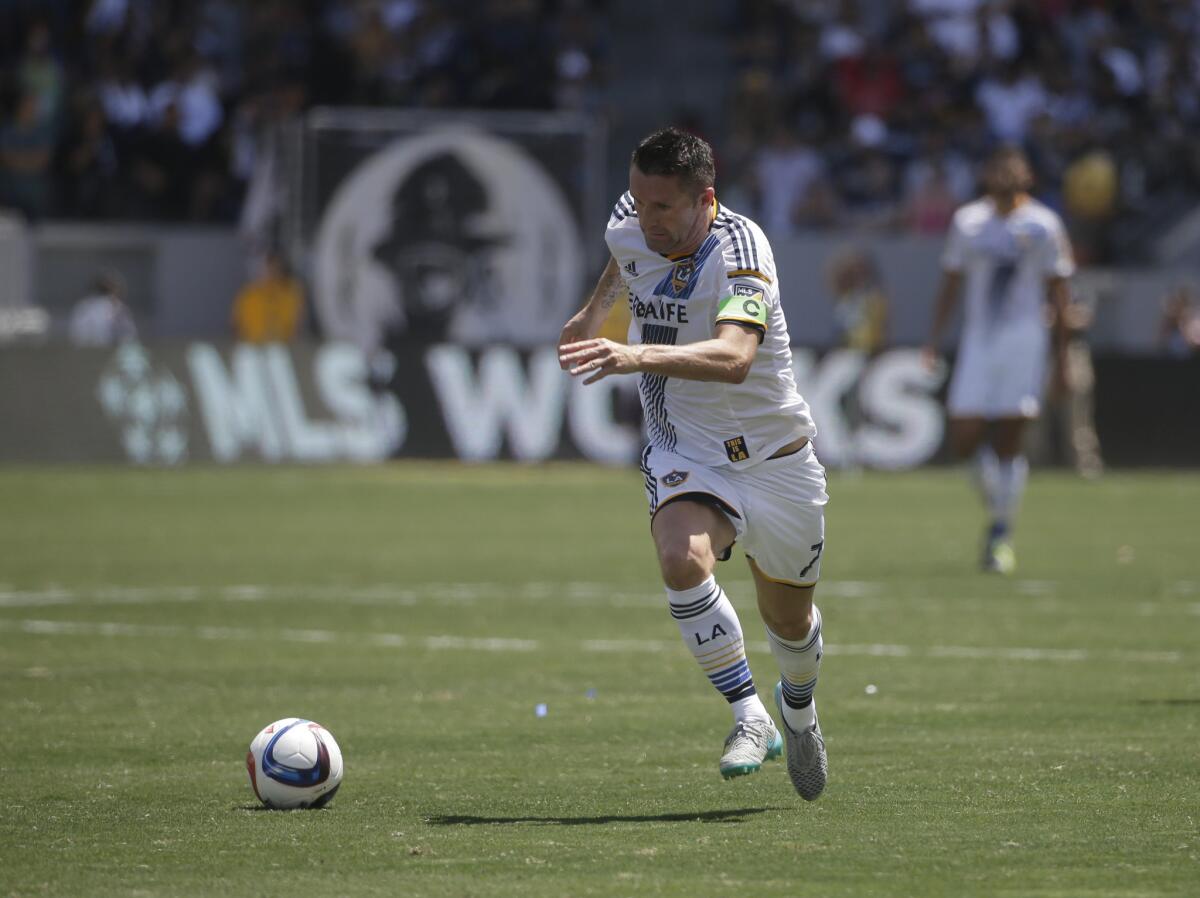 Galaxy forward Robbie Keane has 66 goals in 100 Major League Soccer matches after scoring twice Saturday against FC Dallas.