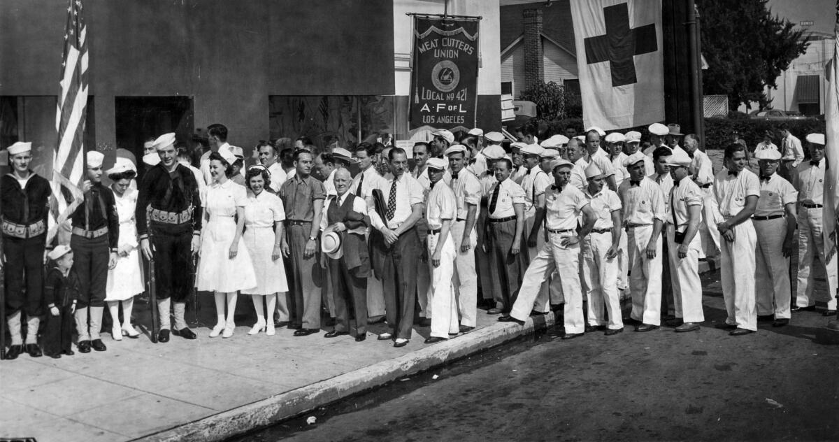 Sept. 7, 1942: Members of the Meat Cutters Union, Local No. 421, line up at the door of a blood bank on Labor Day 1942.