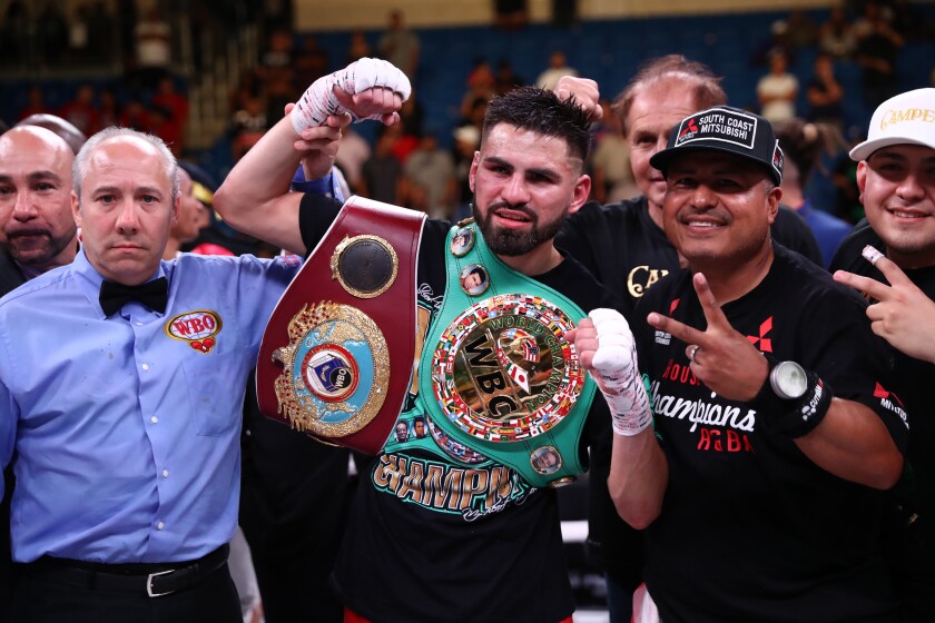 ARLINGTON, TEXAS - JULY 27: Jose Ramirez celebrates his TKO against Maurice Hooker during their WBO & WBC Junior Welterweight World Championship fight at College Park Center on July 27, 2019 in Arlington, Texas. (Photo by Ronald Martinez/Getty Images) ** OUTS - ELSENT, FPG, CM - OUTS * NM, PH, VA if sourced by CT, LA or MoD **