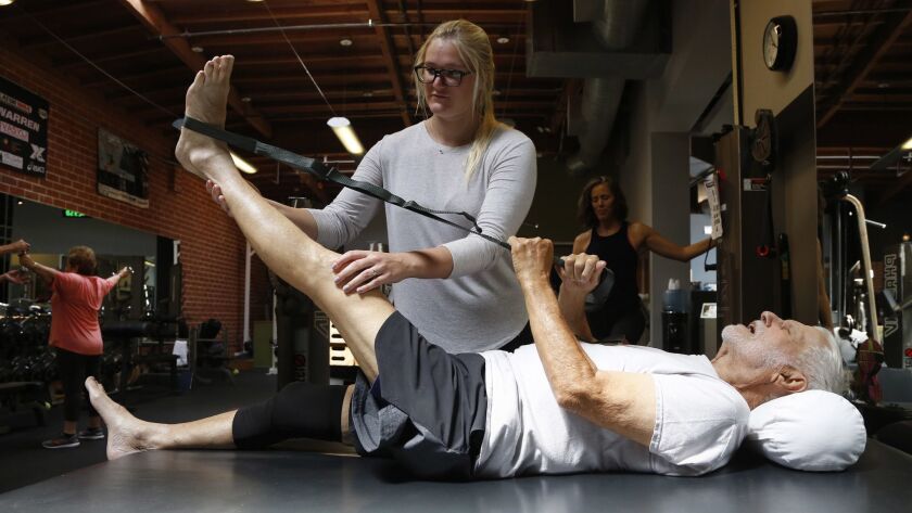 SANTA MONICA, CA- June 12, 2018: Norman Wallack, age 89, works with exercise physiologist Shelby Sto