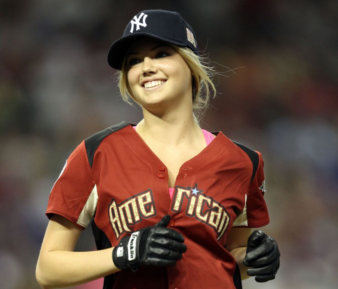 Kate Upton participates in the 2011 Taco Bell All-Star Legends &; Celebrity Softball Game at Chase Field in Phoenix, Arizona.