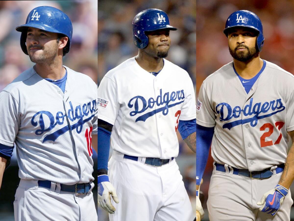 Outfielders Andre Ethier, Carl Crawford and Matt Kemp (left to right) will likely be the source of trade speculation involving the Dodgers.