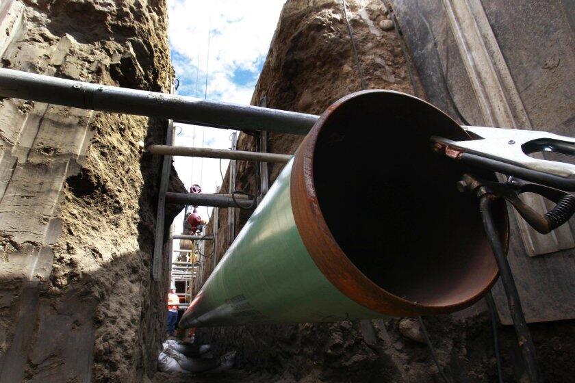 In this file photo, crews from San Diego Gas & Electric inspect and upgrade natural gas pipelines.