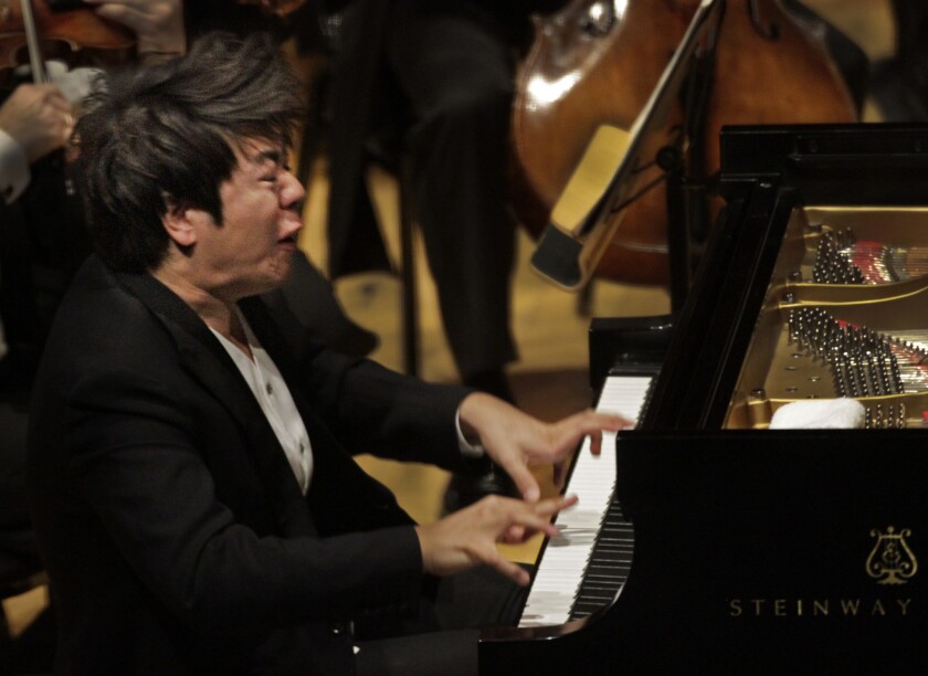 Review Lang Lang is brilliant but bored in concert with L.A. Phil