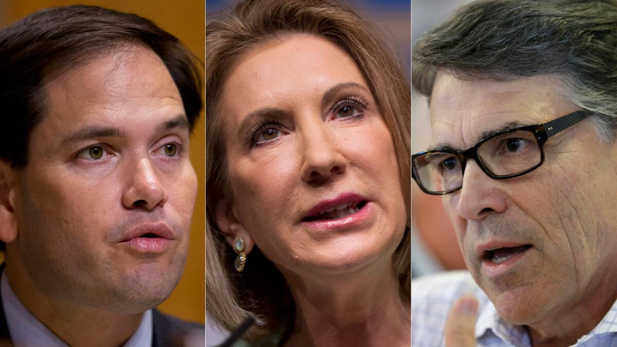 From left, Sen. Marco Rubio, former CEO Carly Fiorina and former Gov. Rick Perry.