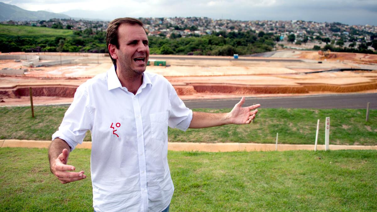 Rio de Janeiro Mayor Eduardo Paes talks to reporters in April at the site of the Olympic Park.