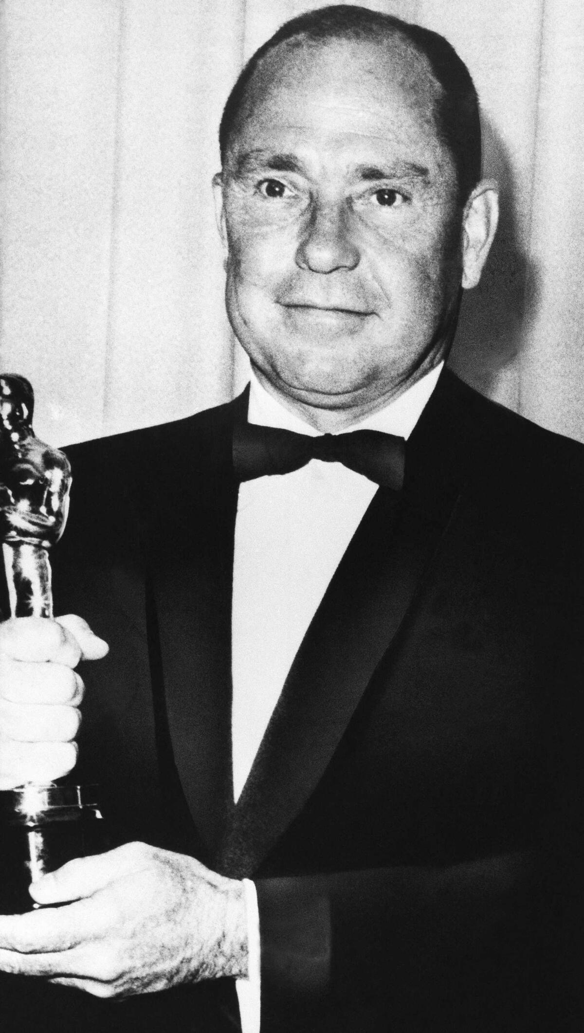 Johnny Mercer with his 1963 Oscar for Best Song, "Days of Wine and Roses."
