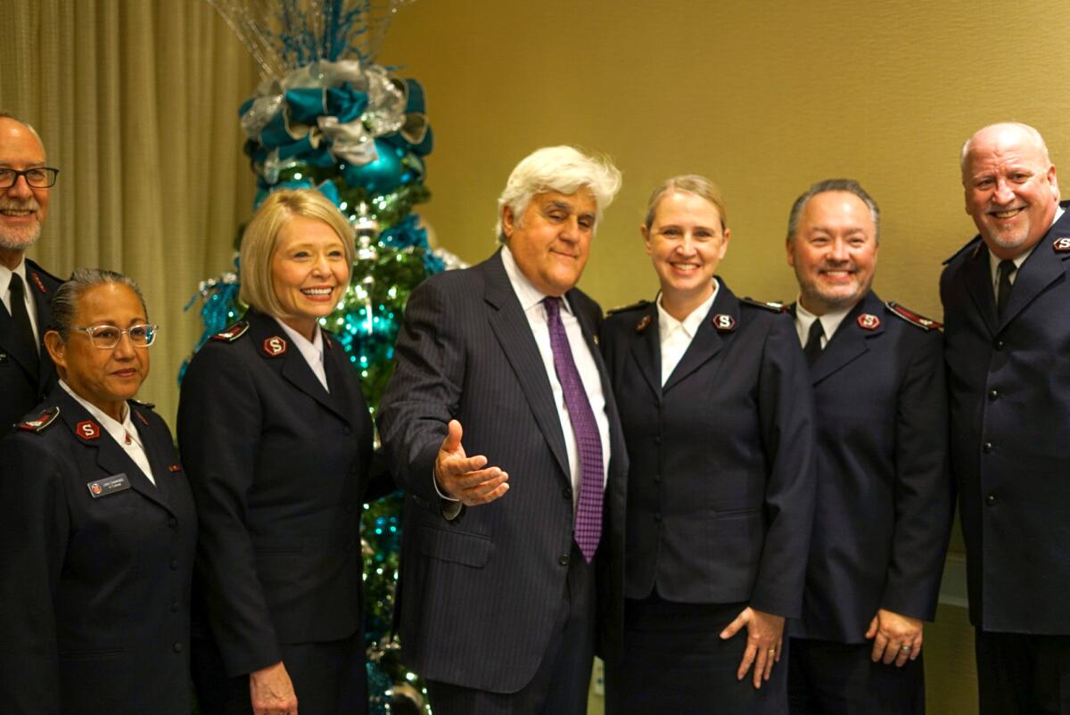 Jay Leno with  Doug and Colleen Riley; Kelly and Donna Igleheart, and John and Lani Chamness.