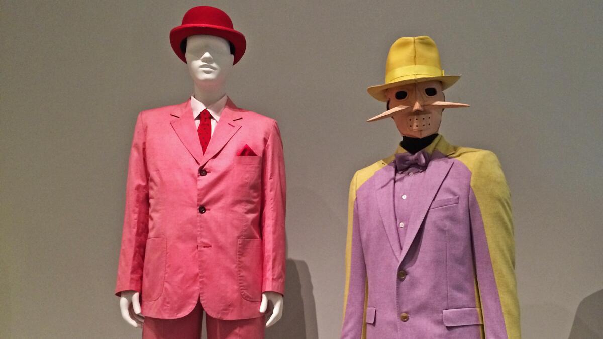 A gallery devoted to more splendid attire features a pink suit from 2005 belonging to a "sapeur," a dandy of the Congo, left. It resonates well with a bright suit by Belgian designer Walter van Beirendonck, from a 2012 collection.