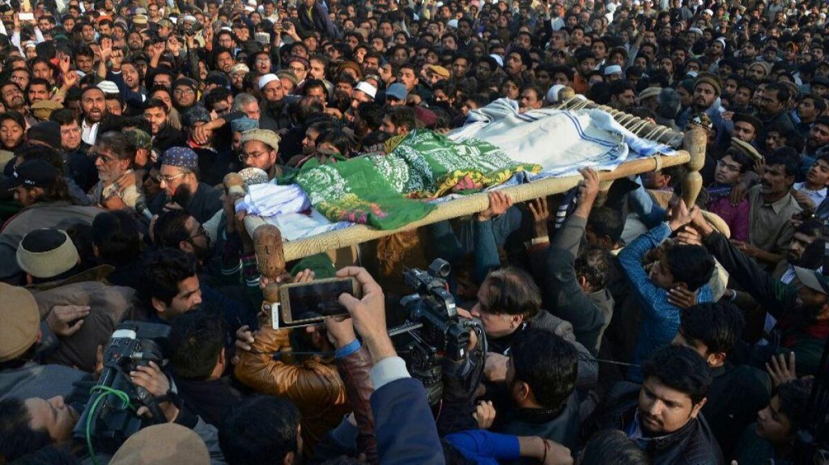 Mourners attend the funeral of Zainab Ansari in Kasur, Pakistan, on Jan. 10, 2018.