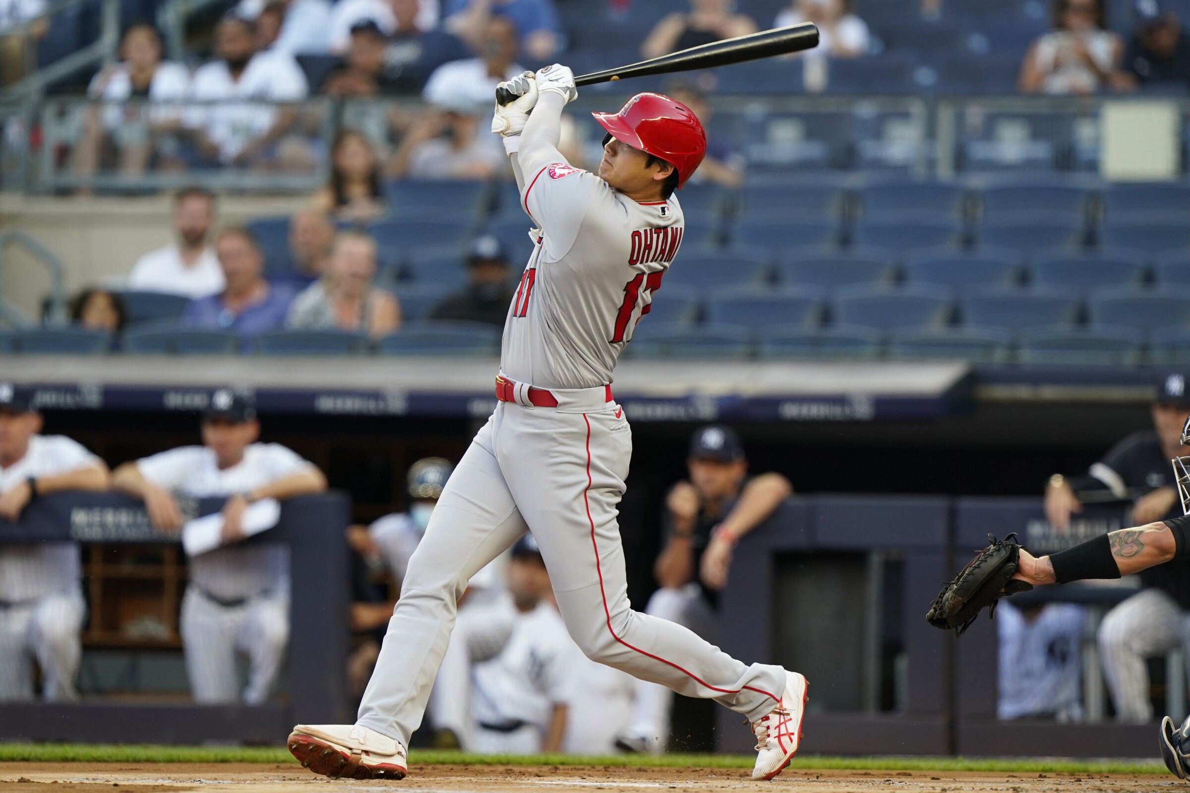 Shohei Ohtani of the Angels follows through on a first-inning home run at Yankee Stadium on Monday.