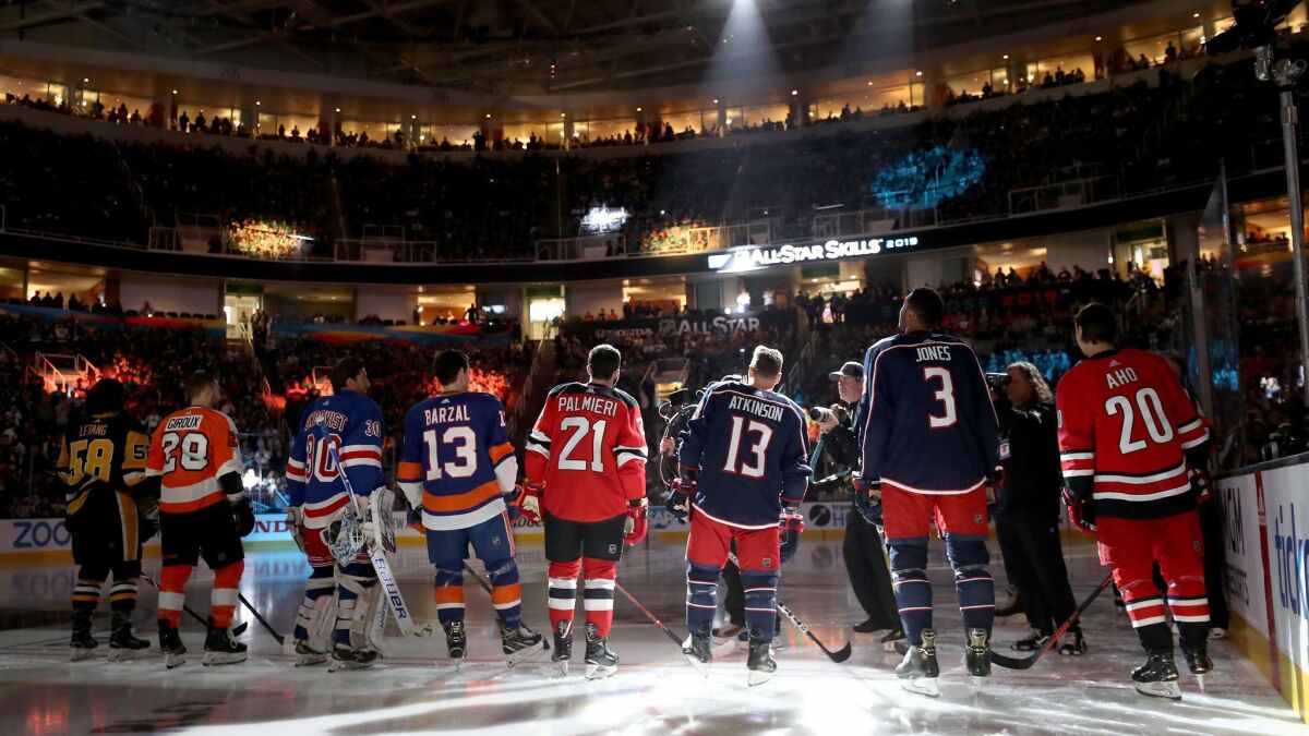 Players line up during the NHL Fastest Skater competition during the 2019 All-Star weekend at the SAP Center in San Jose.