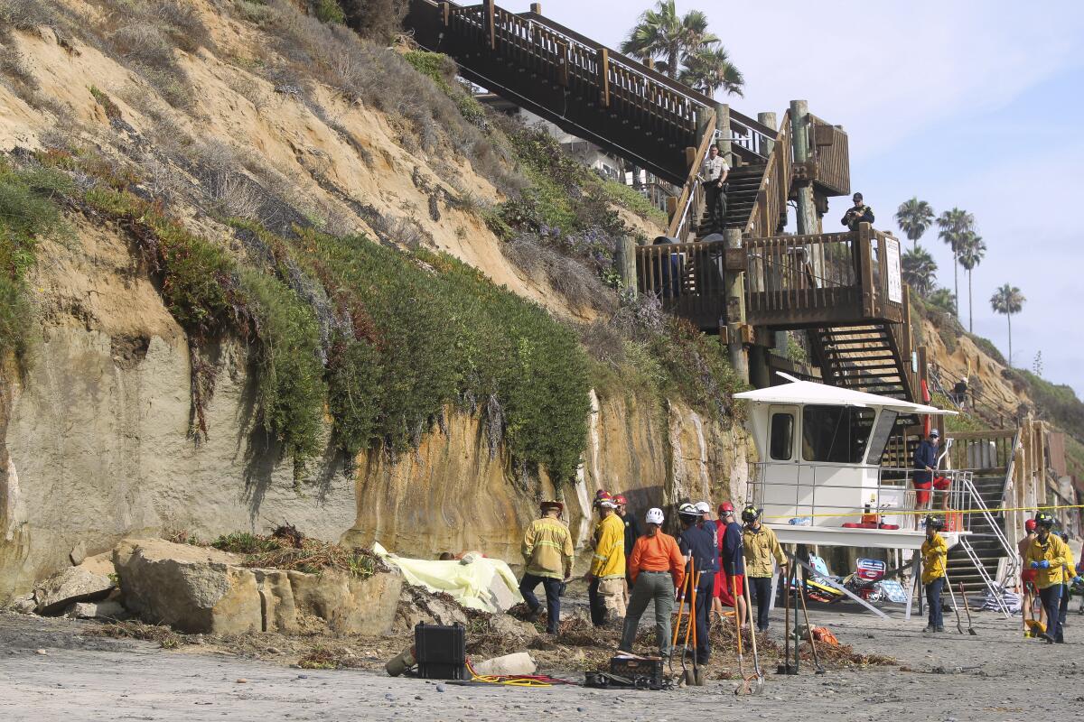 Three people died after an Encinitas beach bluff collapsed Friday afternoon.