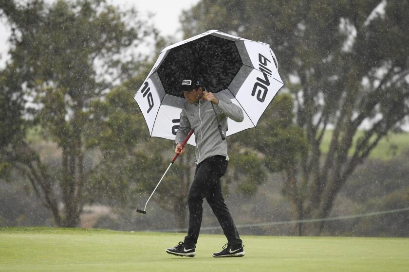 Viktor Hovland, of Norway, walks on the eighth green of the South Course during the second round of the Farmers Insurance Open golf tournament at Torrey Pines, Friday, Jan. 29, 2021, in San Diego. (Photo by Denis Poroy)