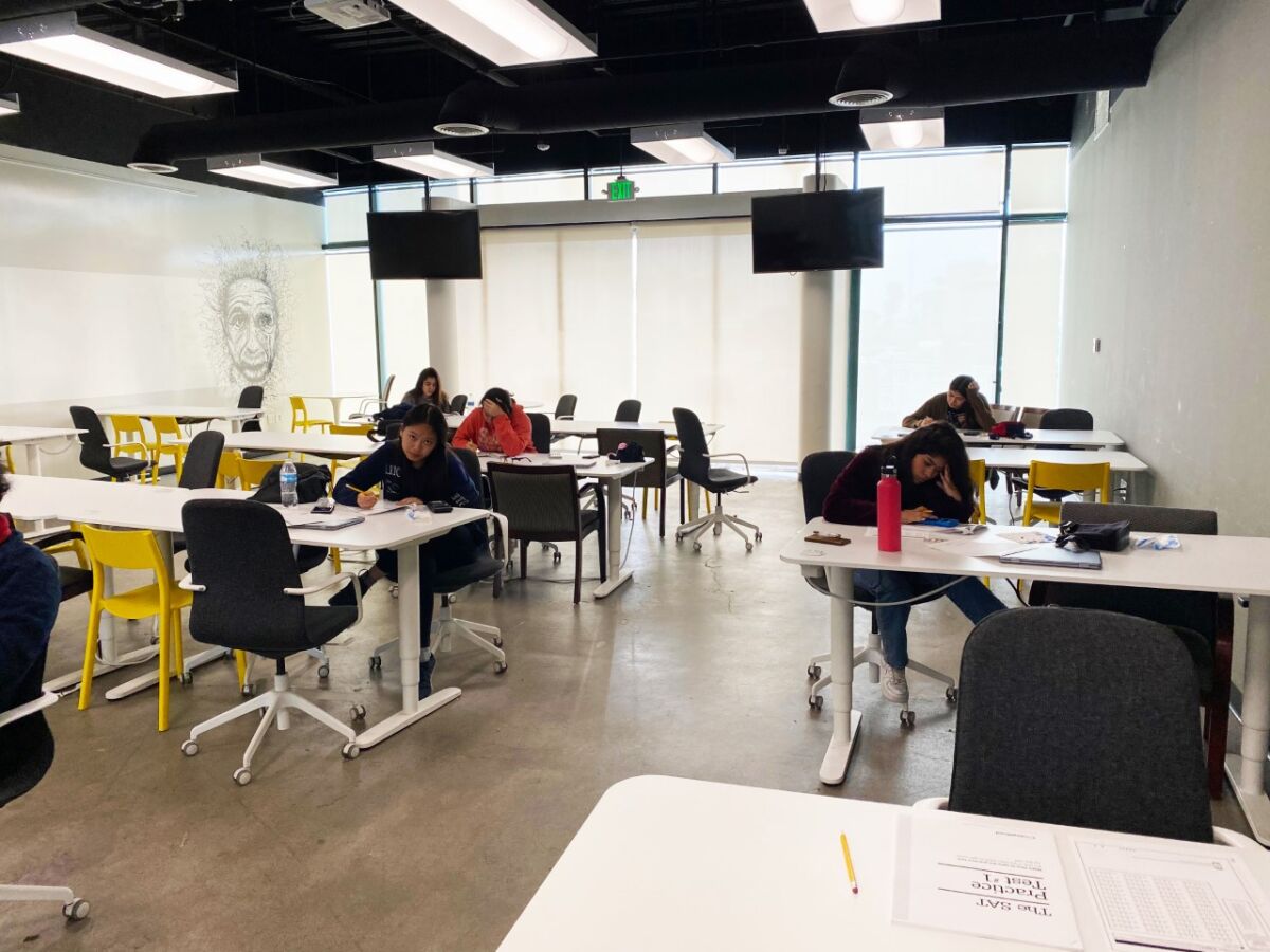 Access Youth Center students working on SAT test prep.