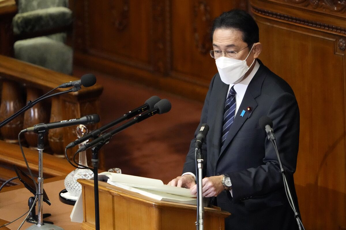 FILE - Japanese Prime Minister Fumio Kishida delivers his policy speech at the lower house Monday, Jan. 17, 2022, in Tokyo. Japan has approved U.S. drugmaker Pfizer Inc.’s COVID-19 pill under a fast-track approval as the country struggles to fight the fast-spreading omicron infections, health officials said Thursday, Feb. 10, 2022. (AP Photo/Eugene Hoshiko, File)