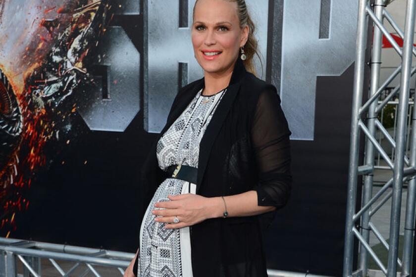 Molly Sims, who is married to "Battleship" producer Scott Stuber, welcomed a baby boy Tuesday.