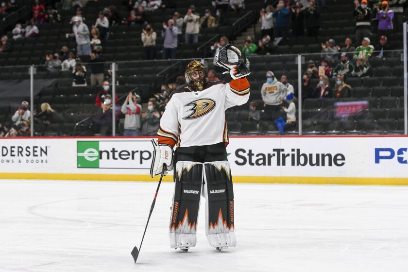 Ducks goalie Ryan Miller waves to the crowd May 8, 2021, after it was announced this would be his last NHL game.