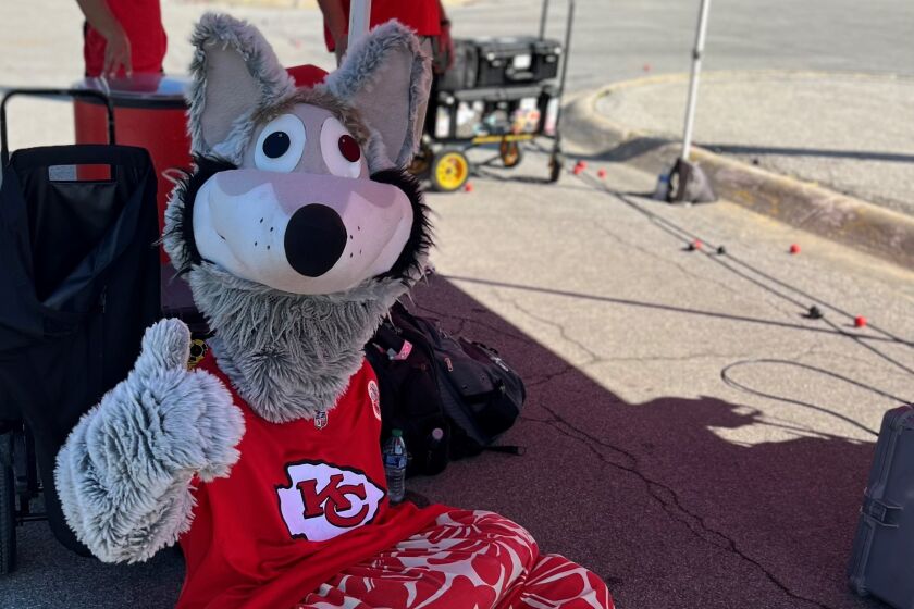 Kansas City Chiefs mascot KC Wolf, with Dan Meers inside, outside of Arrowhead Stadium in the Kansas City parking lot.