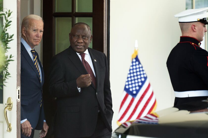 President Joe Biden talks with South African President Cyril Ramaphosa outside the West Wing of the White House following their meeting, Friday, Sept. 16, 2022, in Washington. (AP Photo/Manuel Balce Ceneta)