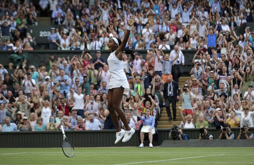 Coco Gauff of the U.S. celebrates after beating Slovenia's Polona Hercog on Centre Court at Wimbledon on July 5.